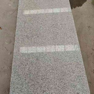 四川芝麻白光面毛板